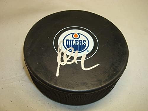 Андрей Секера подписа хокей шайба Едмънтън Ойлърс с автограф от 1B - за Миене на НХЛ с автограф