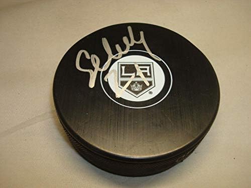 Хокейна шайба с автограф на Никита Щербака Лос Анджелис Кингс 1Б - за Миене на НХЛ с автограф